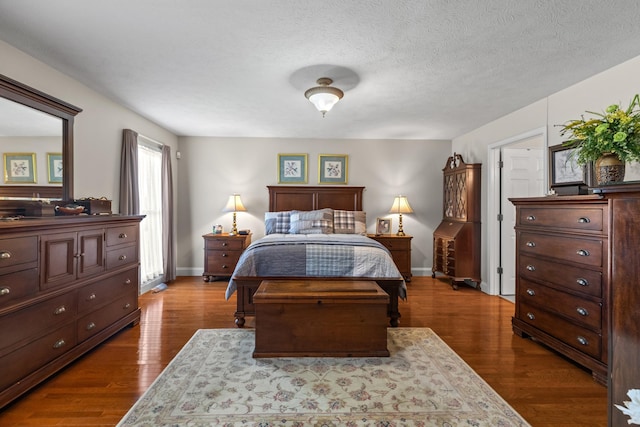 5704 Long Creek Rd, Morristown, TN 37813 - bedroom featuring dark wood-type flooring and a textured ceiling
