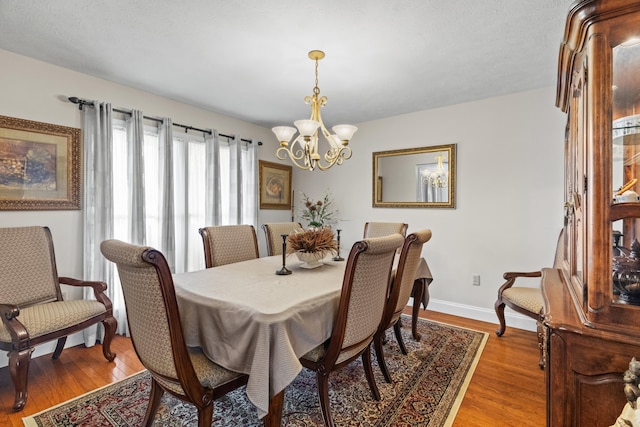 5704 Long Creek Rd, Morristown, TN 37813 - dining room with a chandelier and light wood-style floors