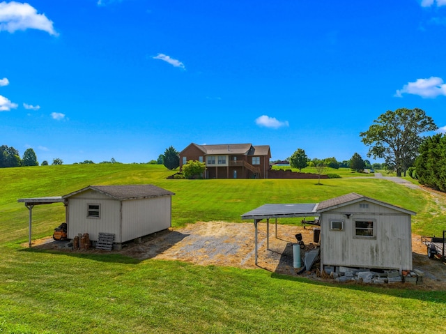 5704 Long Creek Rd, Morristown, TN 37813 - view of grassy yard featuring a storage unit