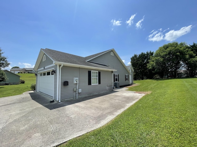 1830 Pheasant Crossing Dr, Dandridge, TN 37725 - view of side of property featuring a lawn, driveway, an attached garage, and a shingled roof