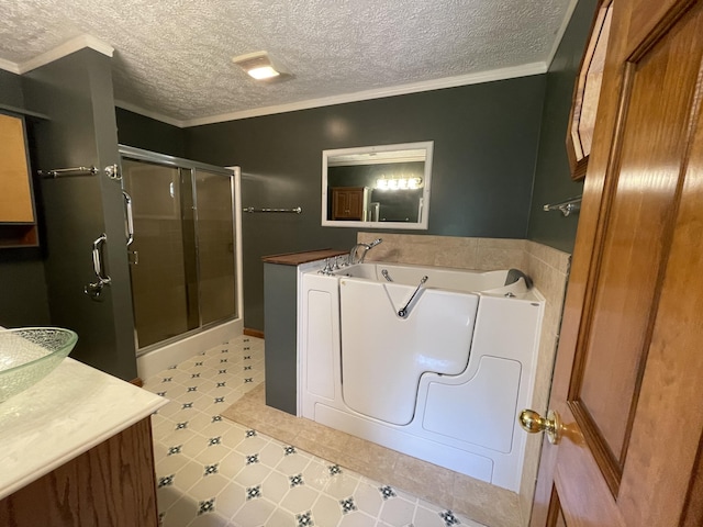 1830 Pheasant Crossing Dr, Dandridge, TN 37725 - bathroom featuring a stall shower, ornamental molding, a bath, vanity, and washer / clothes dryer