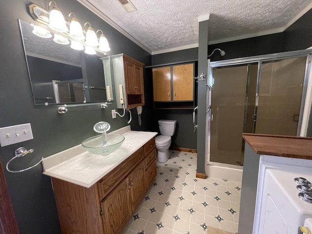 1830 Pheasant Crossing Dr, Dandridge, TN 37725 - full bath featuring a stall shower, vanity, crown molding, a textured ceiling, and tile patterned floors