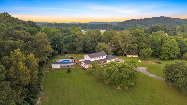 1216 Winding Dr, Sevierville, TN 37876 - aerial view of property and surrounding area with a heavily wooded area