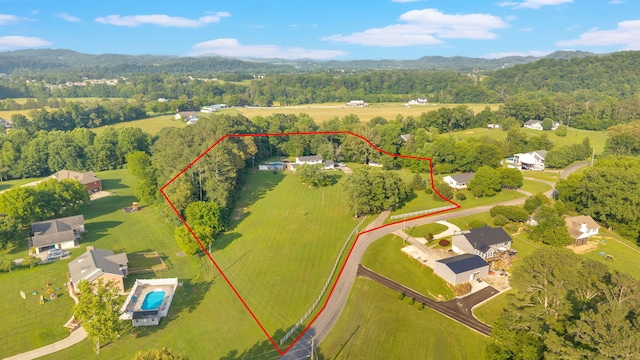 1216 Winding Dr, Sevierville, TN 37876 - aerial overview of property's location with property parcel outlined and a heavily wooded area