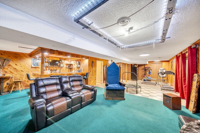 1216 Winding Dr, Sevierville, TN 37876 - cinema featuring wood walls, a textured ceiling, a dry bar, rail lighting, and carpet flooring