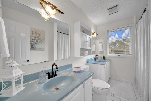 1216 Winding Dr, Sevierville, TN 37876 - full bathroom with vanity, toilet, tile patterned floors, a textured ceiling, and curtained shower