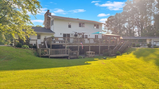 1216 Winding Dr, Sevierville, TN 37876 - back of house featuring a chimney, a deck, stairway, and a yard
