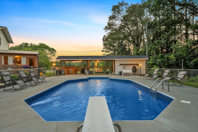 1216 Winding Dr, Sevierville, TN 37876 - view of swimming pool with a patio area and a diving board