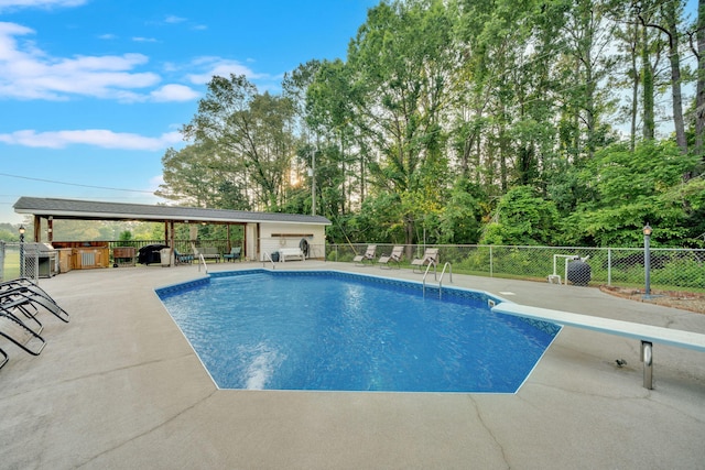 1216 Winding Dr, Sevierville, TN 37876 - view of swimming pool with a patio area and a diving board