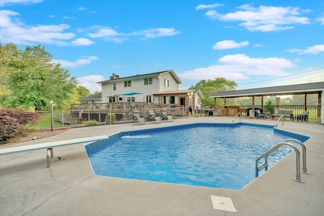 1216 Winding Dr, Sevierville, TN 37876 - view of pool with a diving board and a patio