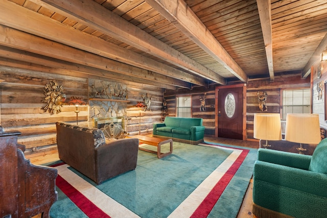 unfurnished living room with wood ceiling, beam ceiling, a fireplace, and rustic walls