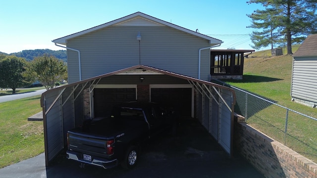 exterior space with a lawn and a garage