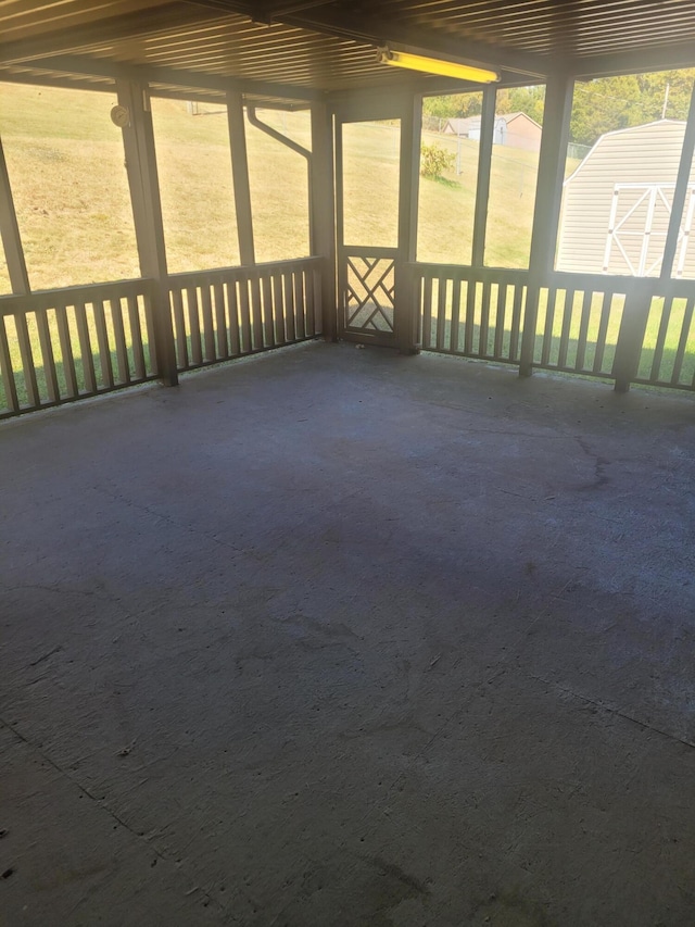 unfurnished sunroom with a healthy amount of sunlight