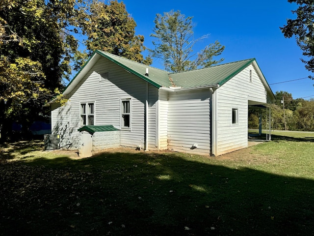 exterior space featuring a lawn and cooling unit