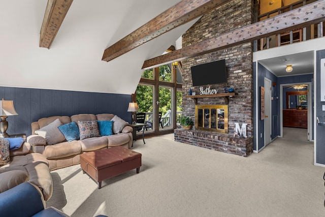 1116 Patterson St, Dandridge, TN 37725 - carpeted living area featuring beamed ceiling, high vaulted ceiling, a fireplace, wainscoting, and wood walls