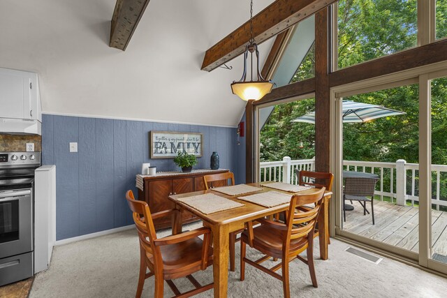 1116 Patterson St, Dandridge, TN 37725 - dining space with wood walls and light colored carpet