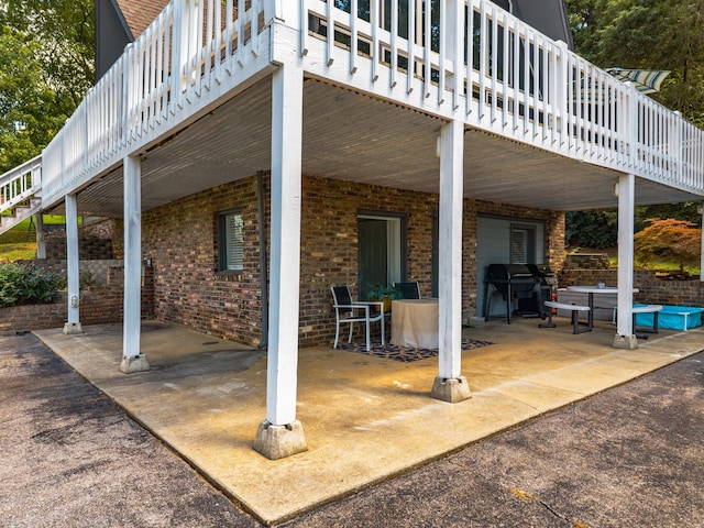 1116 Patterson St, Dandridge, TN 37725 - view of patio with a grill and a deck