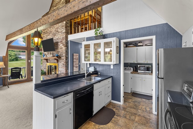1116 Patterson St, Dandridge, TN 37725 - kitchen with dishwasher, stainless steel microwave, dark countertops, separate washer and dryer, and white cabinets