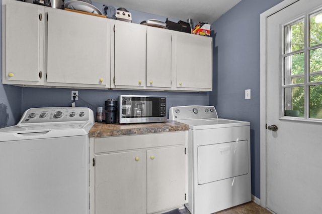 1116 Patterson St, Dandridge, TN 37725 - laundry area with cabinet space, healthy amount of natural light, and washing machine and dryer
