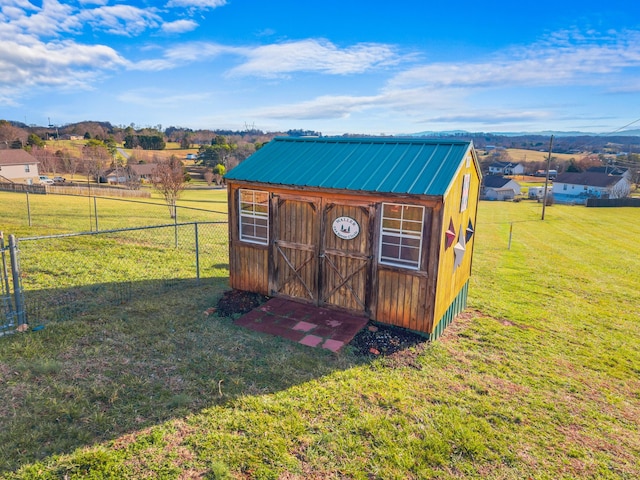 view of outdoor structure with a yard