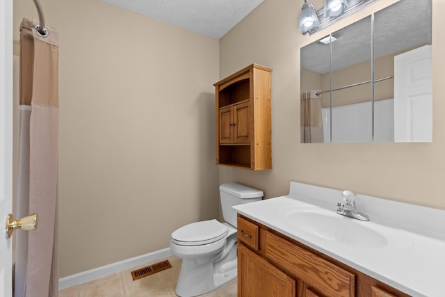 bathroom with walk in shower, toilet, a textured ceiling, vanity, and tile patterned flooring