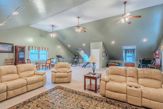 living room with ceiling fan, light colored carpet, and high vaulted ceiling