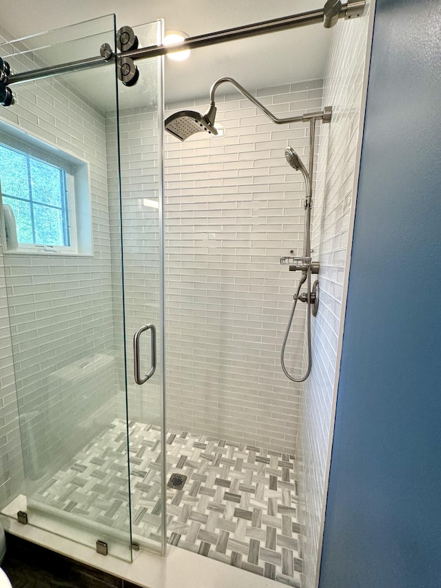 bathroom featuring a shower stall