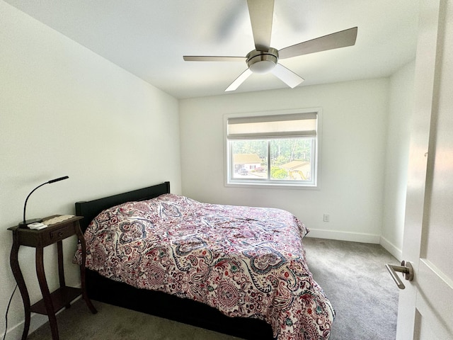 carpeted bedroom featuring a ceiling fan and baseboards