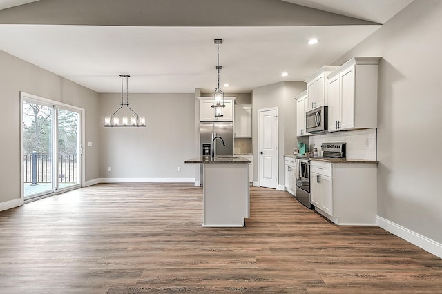 518 Deborahs Way, Greeneville, TN 37743 - kitchen featuring appliances with stainless steel finishes, baseboards, recessed lighting, backsplash, and dark wood-style floors