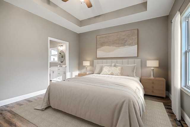 518 Deborahs Way, Greeneville, TN 37743 - bedroom featuring wood finished floors, baseboards, a raised ceiling, and ensuite bathroom