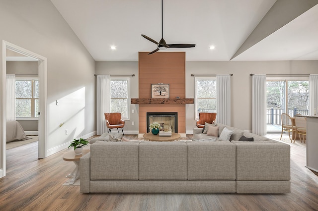 518 Deborahs Way, Greeneville, TN 37743 - living room with lofted ceiling, ceiling fan, plenty of natural light, a fireplace, and wood finished floors