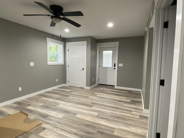 interior space featuring ceiling fan and light hardwood / wood-style floors