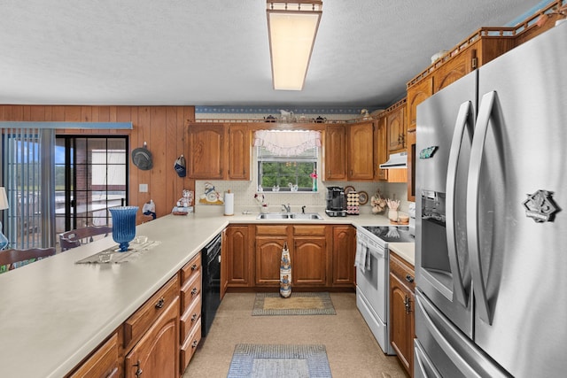 4715/4685 Old Kentucky Rd, Morristown, TN 37814 - kitchen featuring stainless steel fridge, white range with electric stovetop, dishwasher, a sink, and brown cabinetry