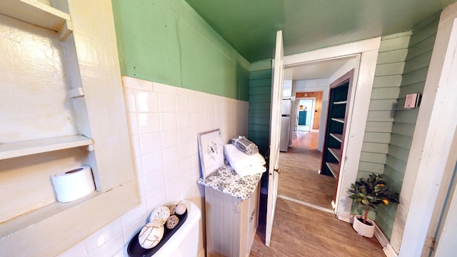 hallway featuring wood-type flooring