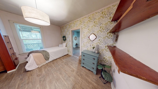 bedroom with light wood-type flooring