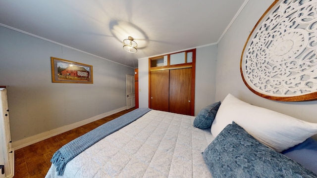 bedroom featuring a closet, hardwood / wood-style floors, and ornamental molding