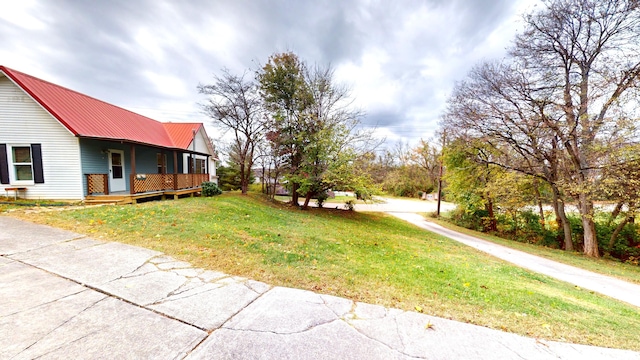 view of yard featuring a porch