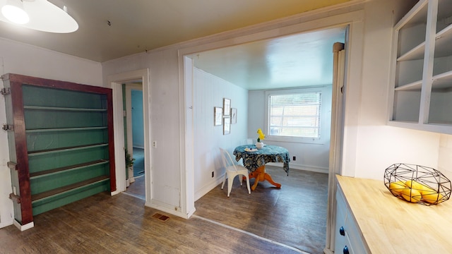 dining area with dark wood-type flooring