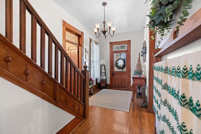 989 E Dumplin Valley Rd, Jefferson City, TN 37760 - entryway featuring a chandelier, stairway, and wood finished floors