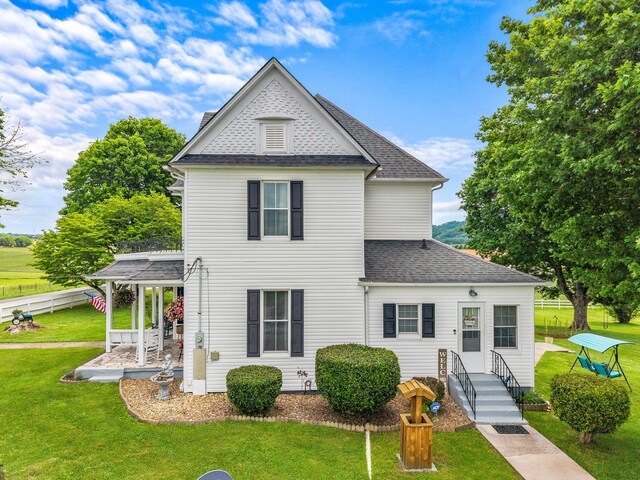 989 E Dumplin Valley Rd, Jefferson City, TN 37760 - view of front facade featuring a shingled roof and a patio
