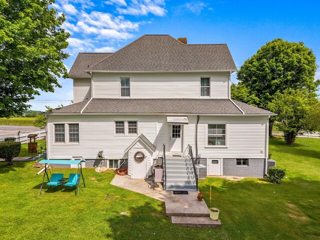 989 E Dumplin Valley Rd, Jefferson City, TN 37760 - back of property with a chimney, a yard, and roof with shingles