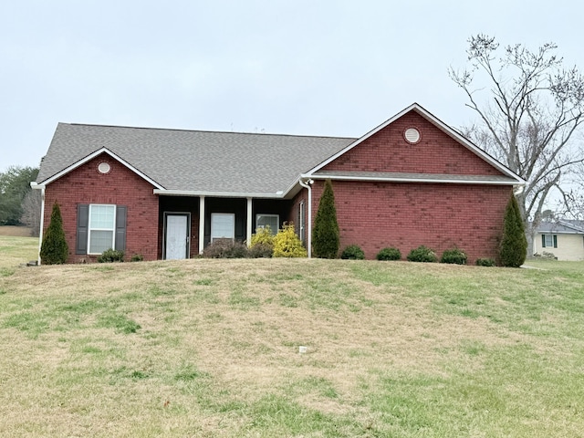 ranch-style home with a front yard