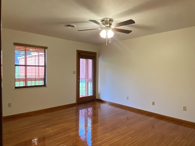 unfurnished room featuring wood-type flooring and ceiling fan