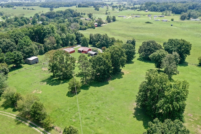 birds eye view of property with a rural view