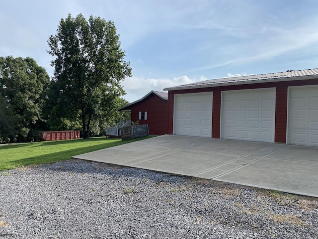 garage with a yard