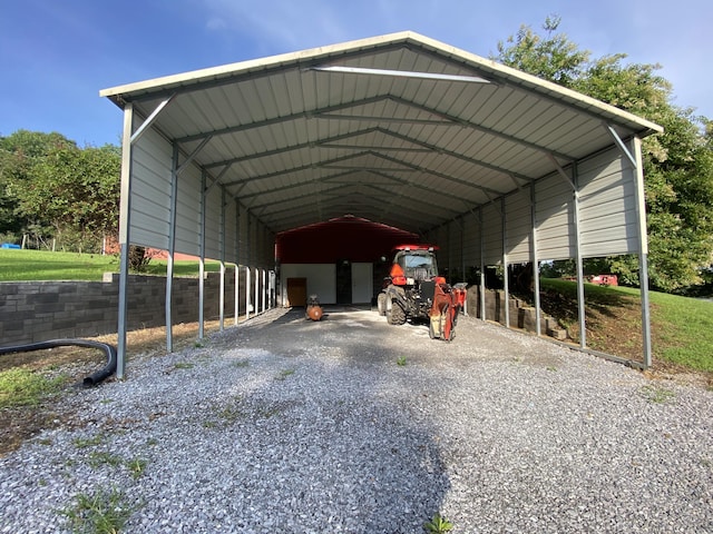 view of vehicle parking featuring a carport