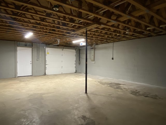 basement featuring electric panel