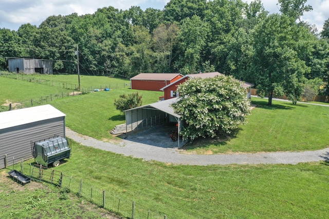 birds eye view of property featuring a rural view