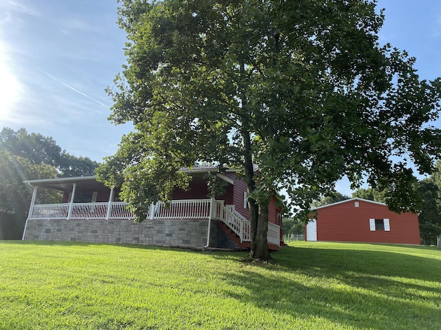 view of yard with a porch