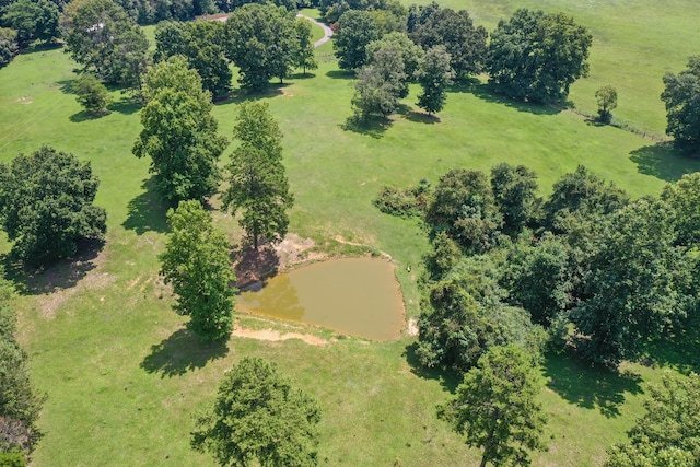 aerial view with a rural view and a water view